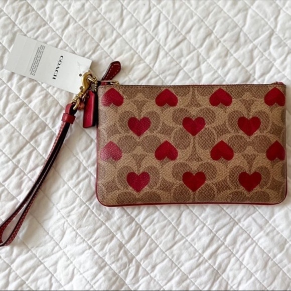 Coach Handbags - NWT Coach Signature Heart Wristlet